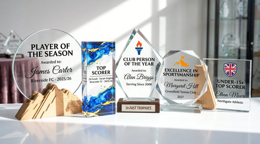 Display of five custom sports trophies and awards, including Player of the Season, Top Scorer, Club Person of the Year, Excellence in Sportsmanship, and Under-15s Top Scorer awards.