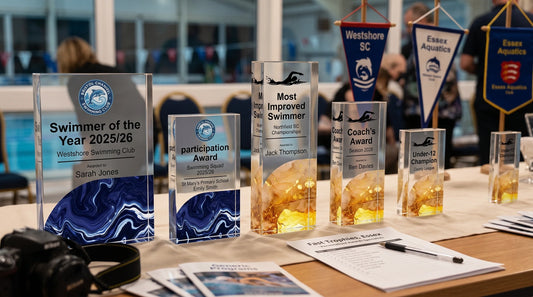Personalised swimming trophies UK for club galas, including Swimmer of the Year, Most Improved Swimmer and junior swimming awards.