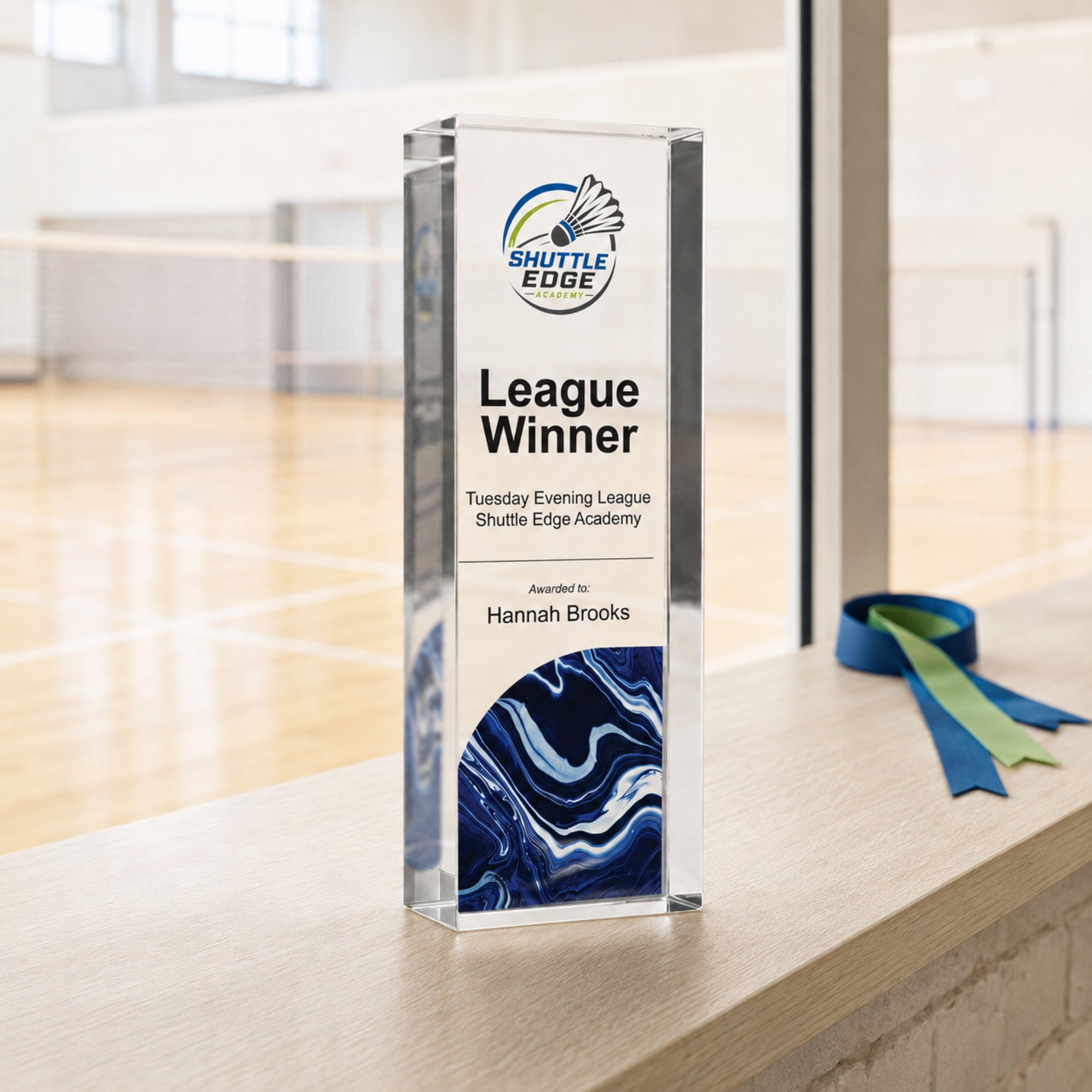 Slim upright badminton trophy printed with a club crest for a league winner award