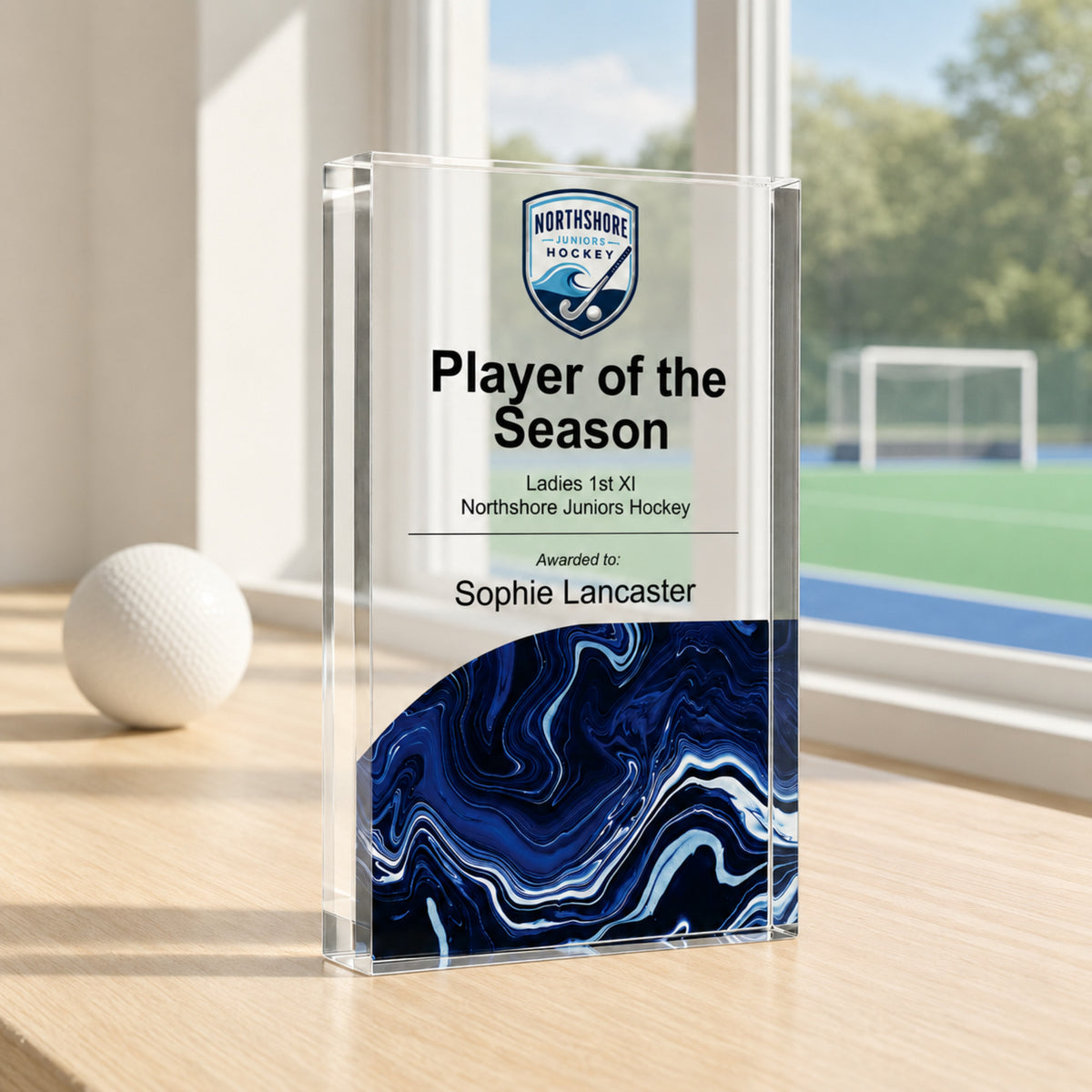 Slim upright hockey trophy printed with a club crest for a Player of the Season award