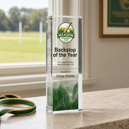 Slim upright rounders trophy printed with a school crest for a Backstop of the Year award