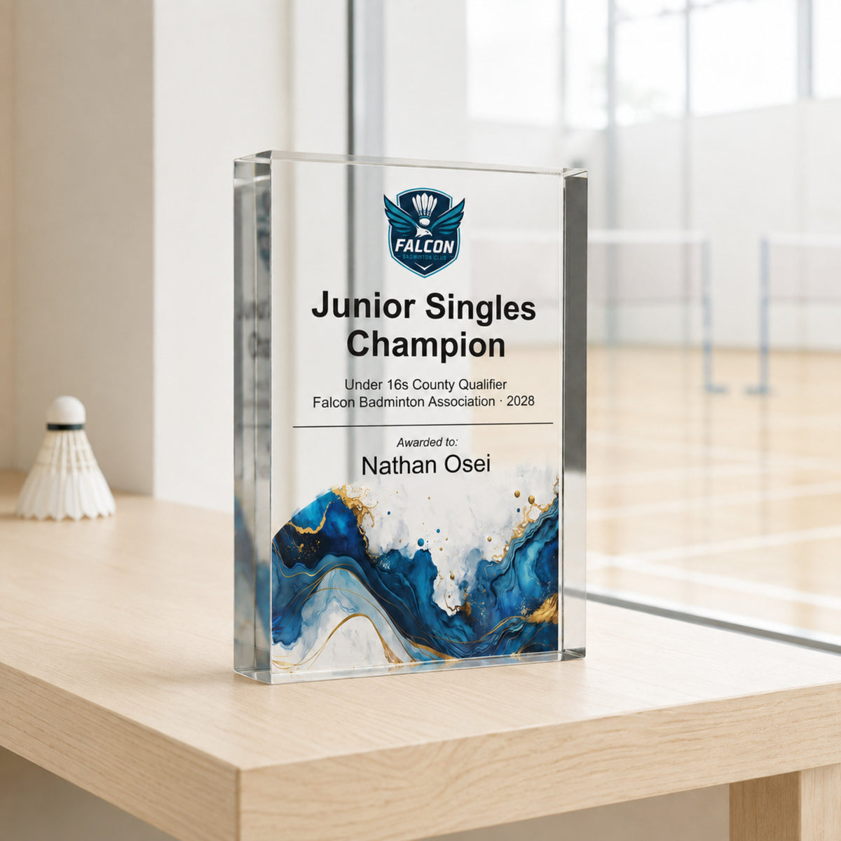 Slim upright Junior Singles Champion badminton trophy with a club crest
