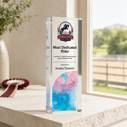 Slim upright equestrian trophy printed with a riding centre crest for a dedicated rider award