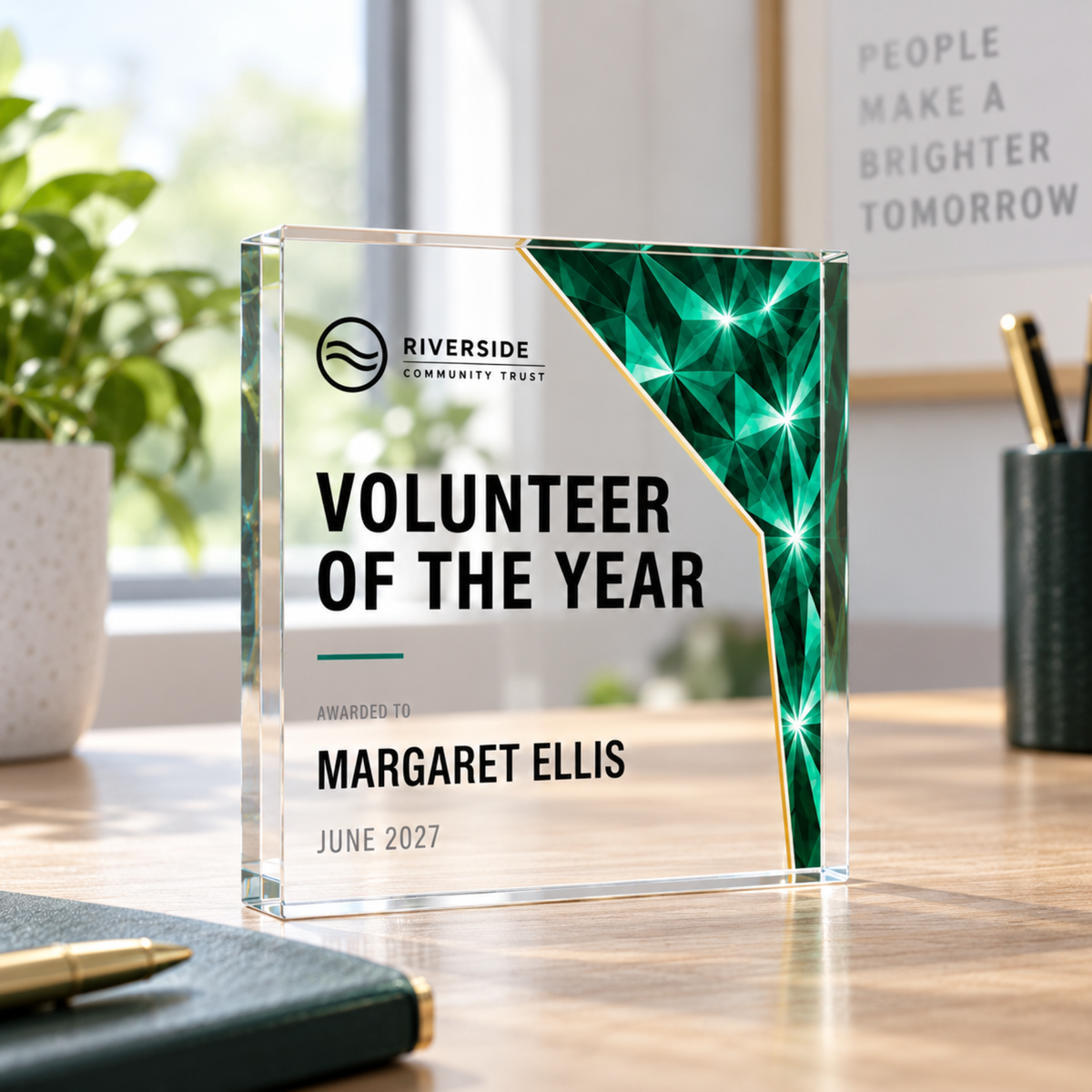Volunteer of the Year custom award with charity logo, green glass-effect prism acrylic