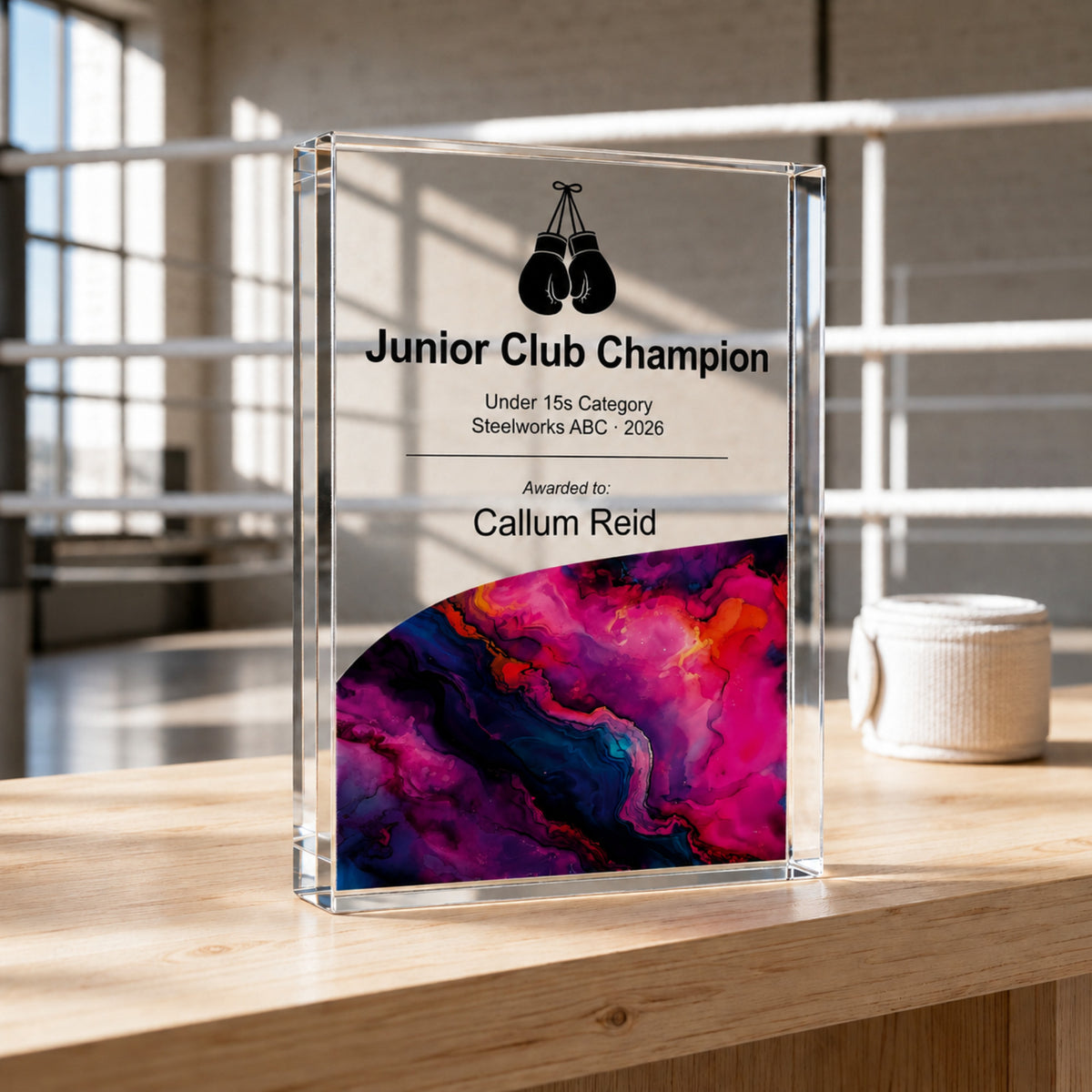 Junior Club Champion boxing trophy with a boxing glove symbol for a youth section