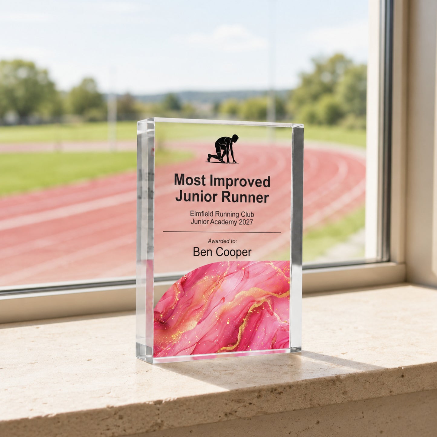Most Improved Junior Runner trophy for a running club junior academy