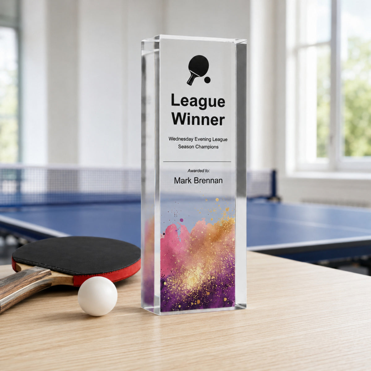 Slim upright League Winner table tennis trophy with a bat and ball symbol