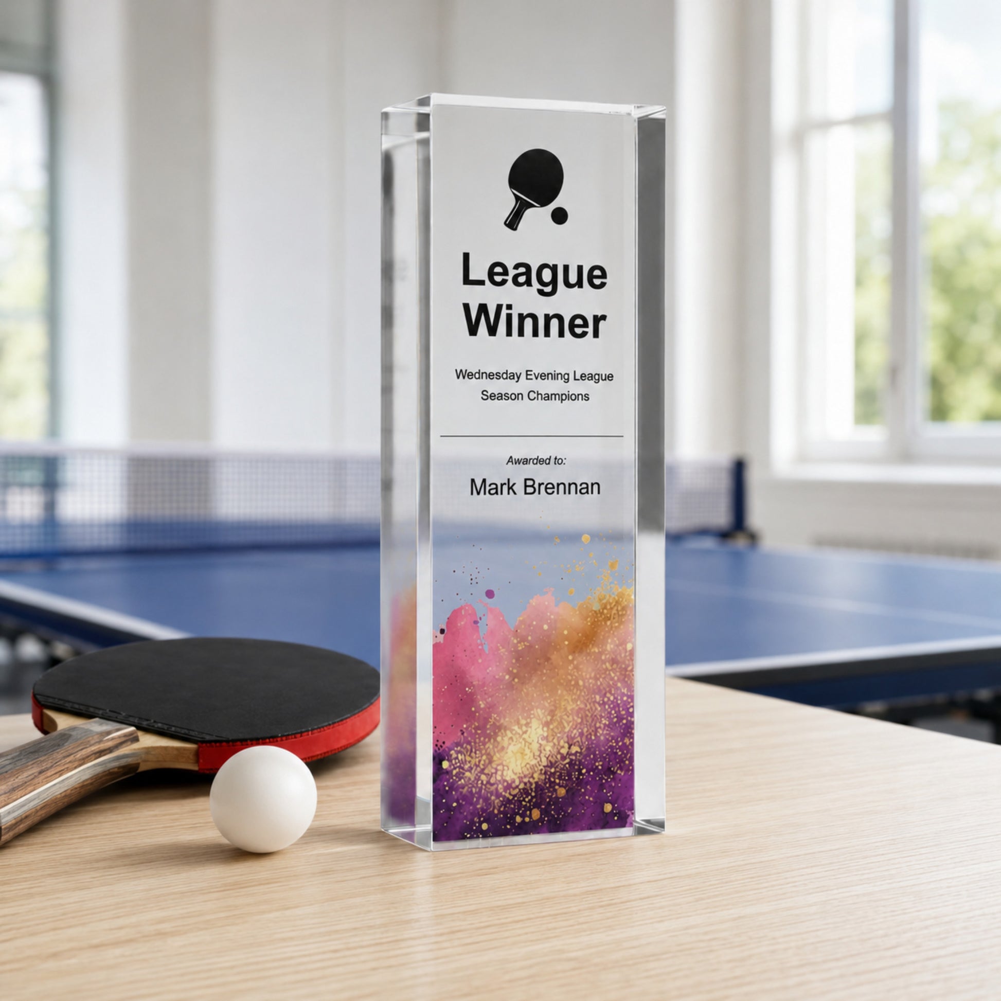 Slim upright League Winner table tennis trophy with a bat and ball symbol